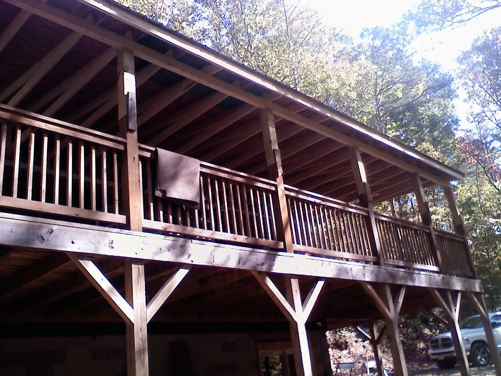Timber framing under a new elevated porch and deck — Roof Leak Repair in Eagan by Roofing Brothers